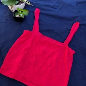 Bright pink cropped top